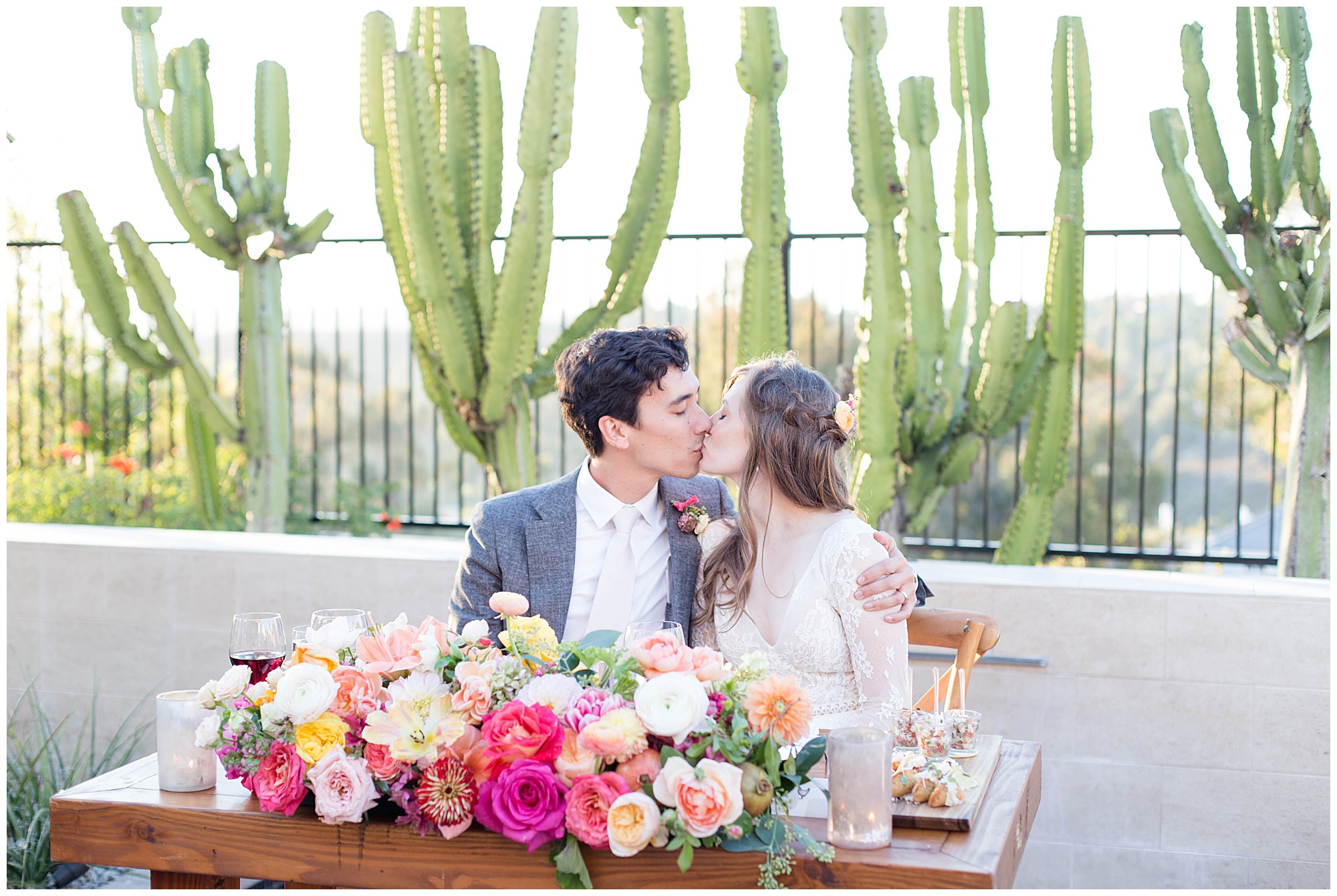 bride and groom at sweetheart table 