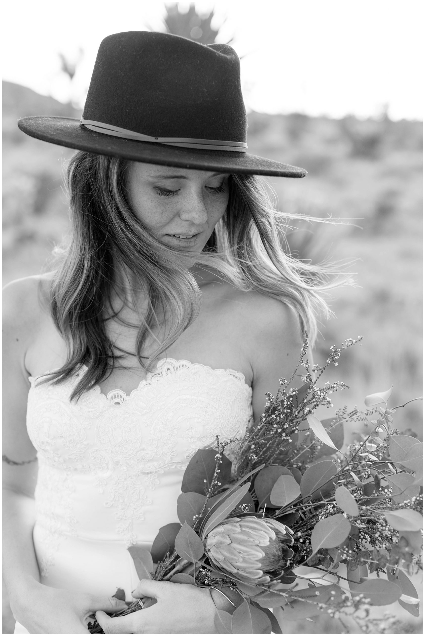 bride holding a bouquet in joshua tree