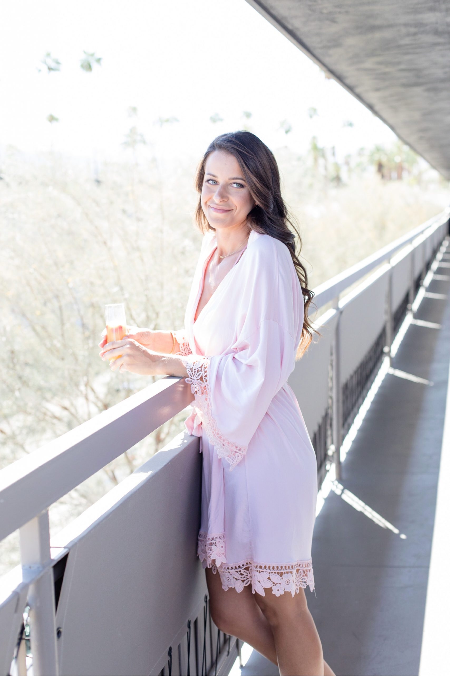 bride in getting ready robe