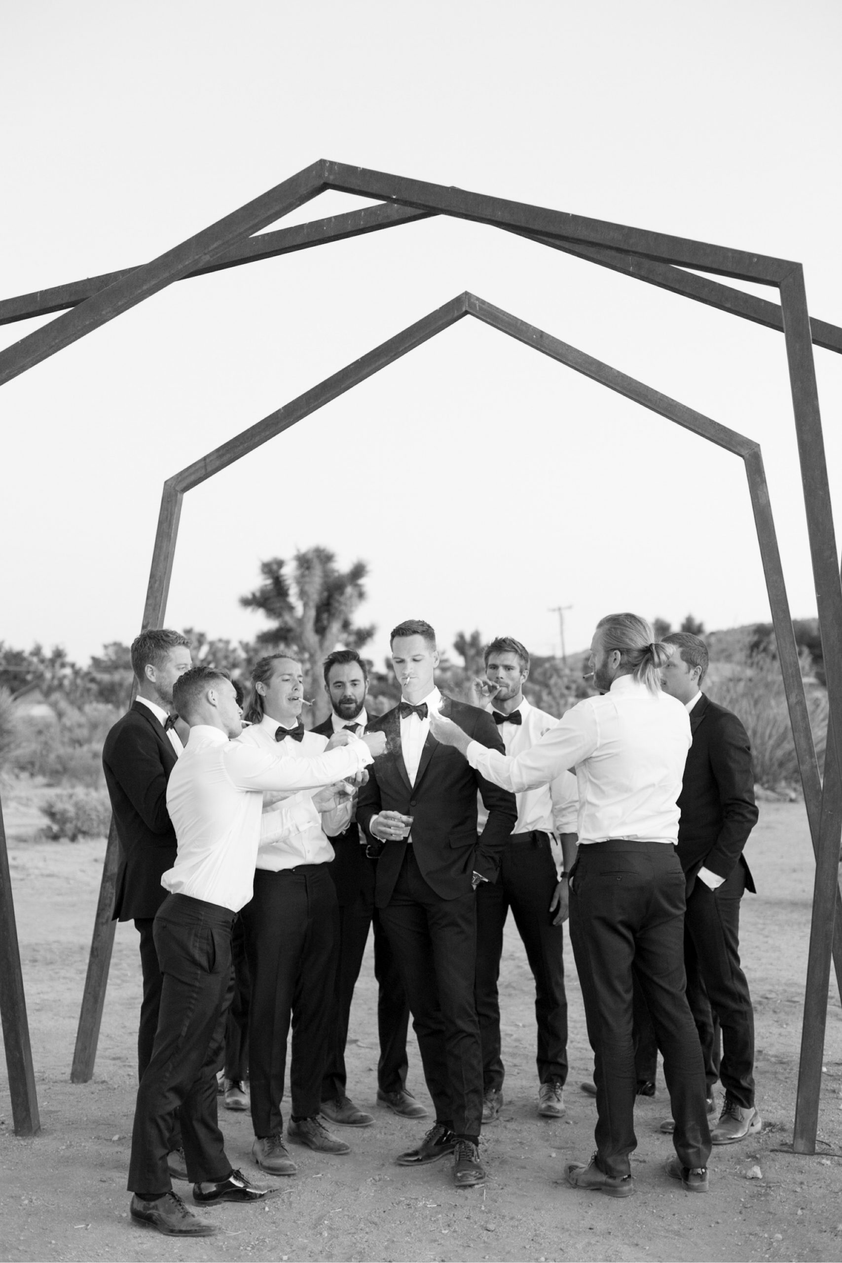 groomsmen lighting a joint