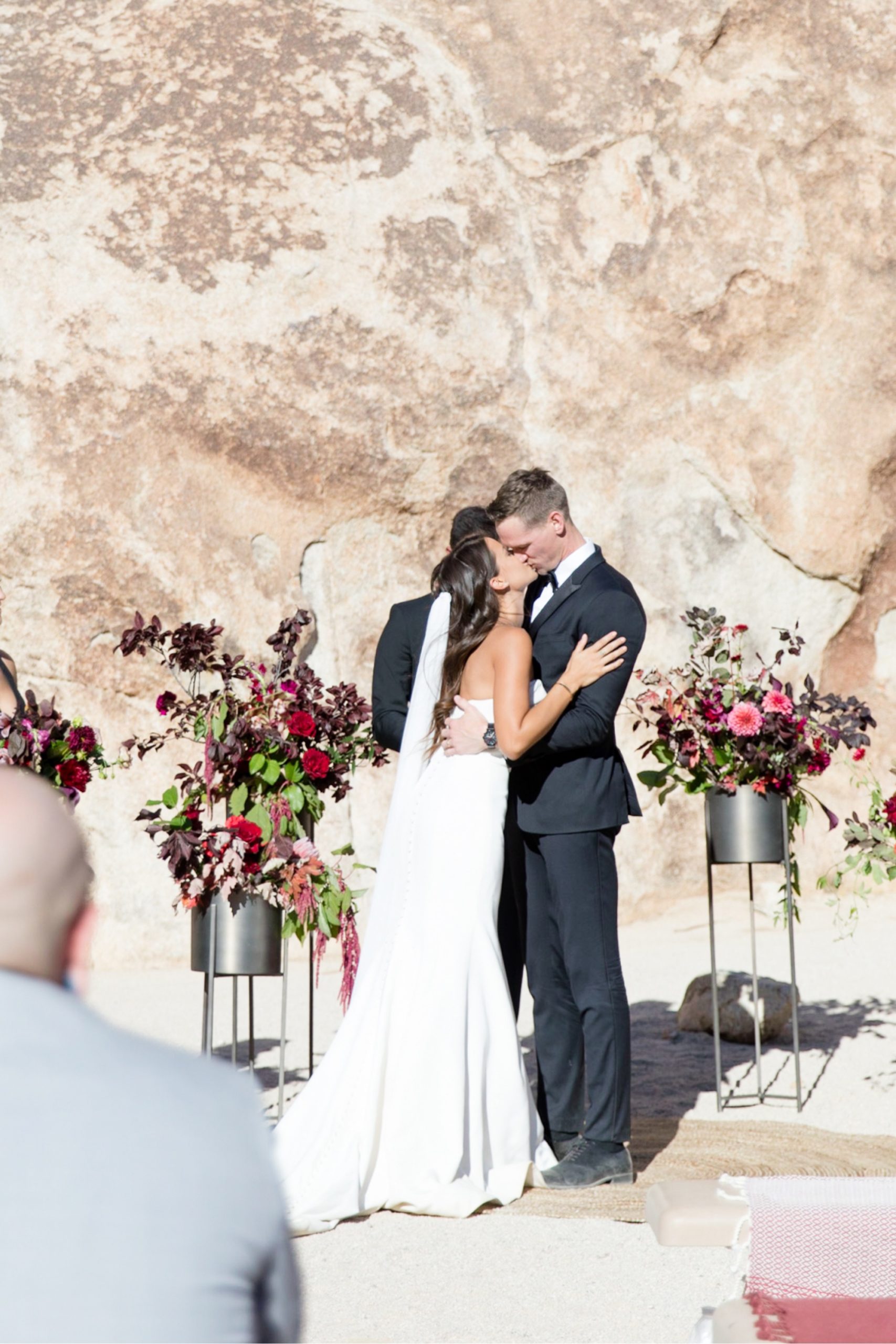 bride and groom kissing at Indian Cove Amphitheater Wedding ceremony