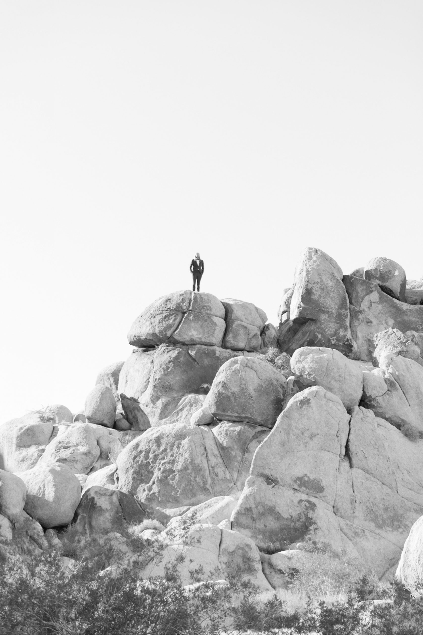 groomsman climbing joshua tree