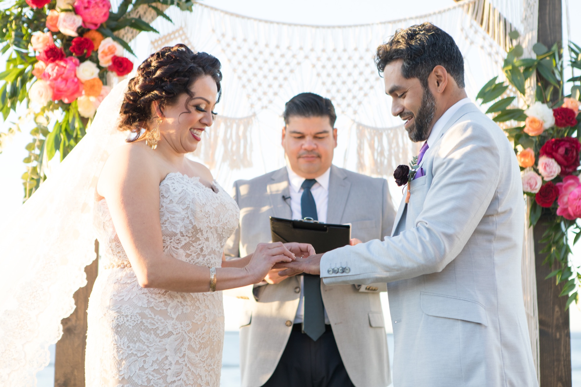 exchanging rings at Scripps Park Wedding in La Jolla