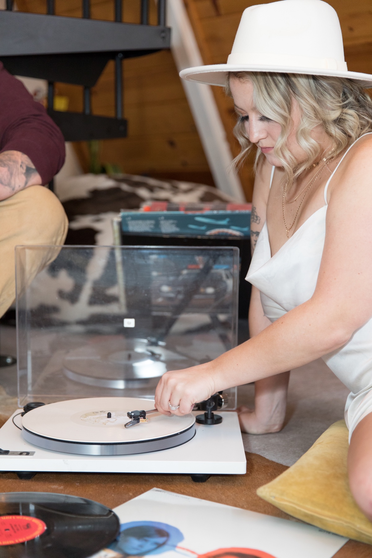 forest engagement photos in a cabin with a record player