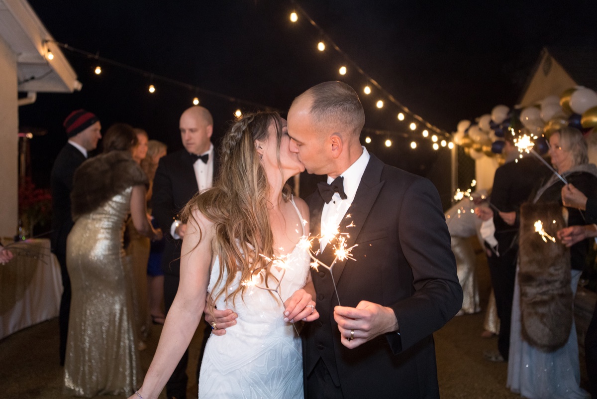 new years eve sparklers at oceanside wedding