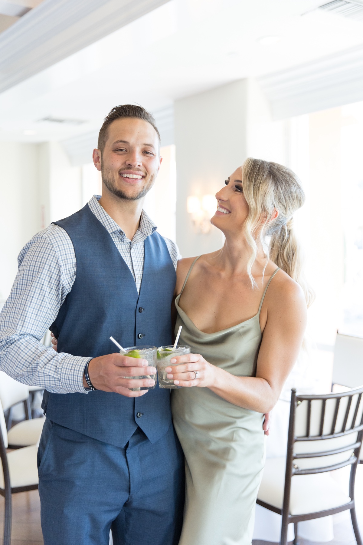 couple cheersing at wedding reception