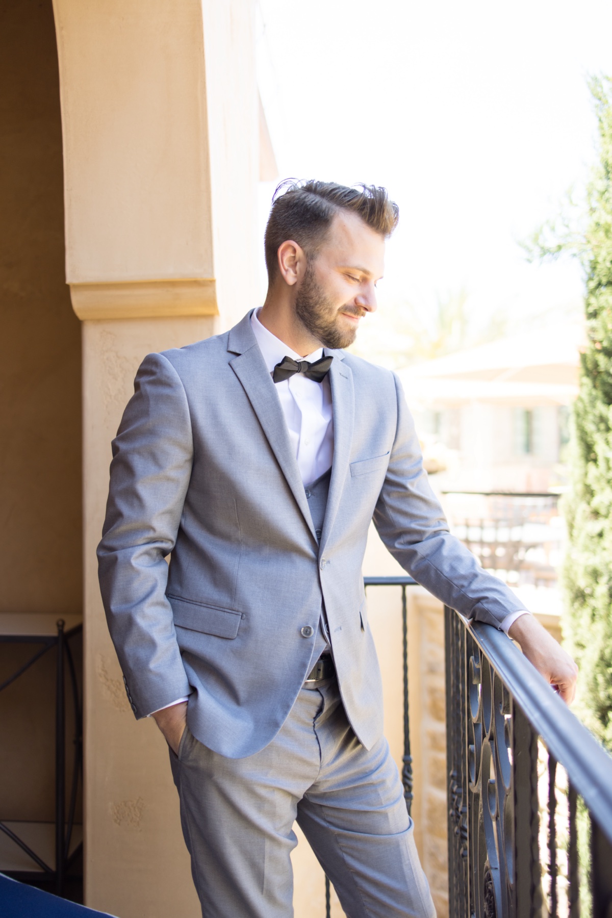 friar tux grey suit black bow tie