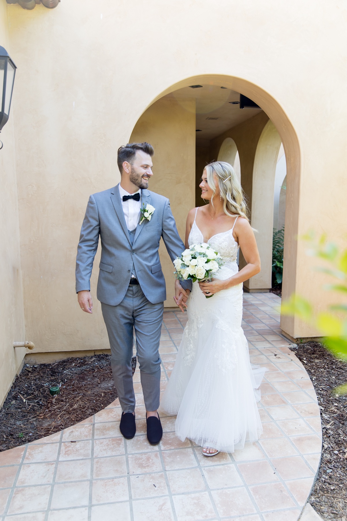 bride and groom walking to get married