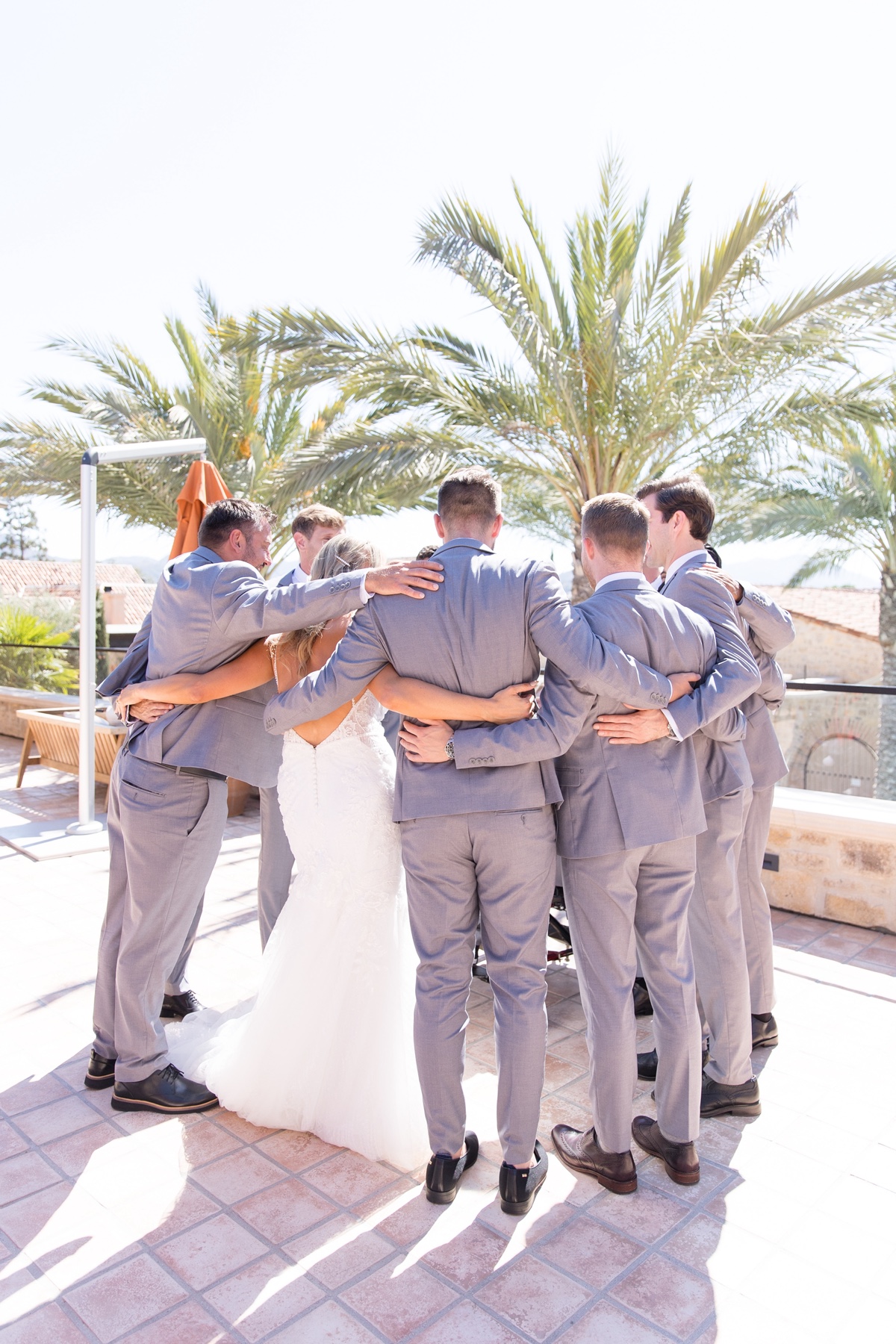 bridal party group hug