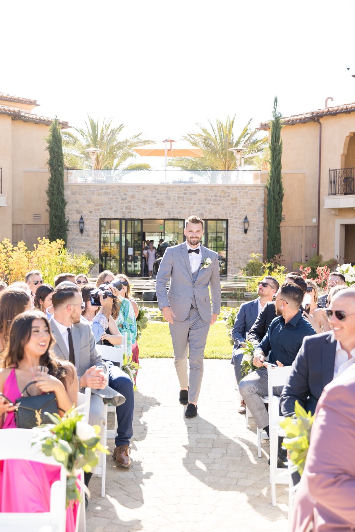 groom walking down the aisle at los angeles wedding