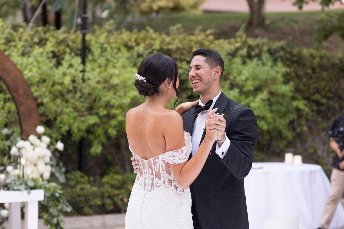 wedding first dance in the rain