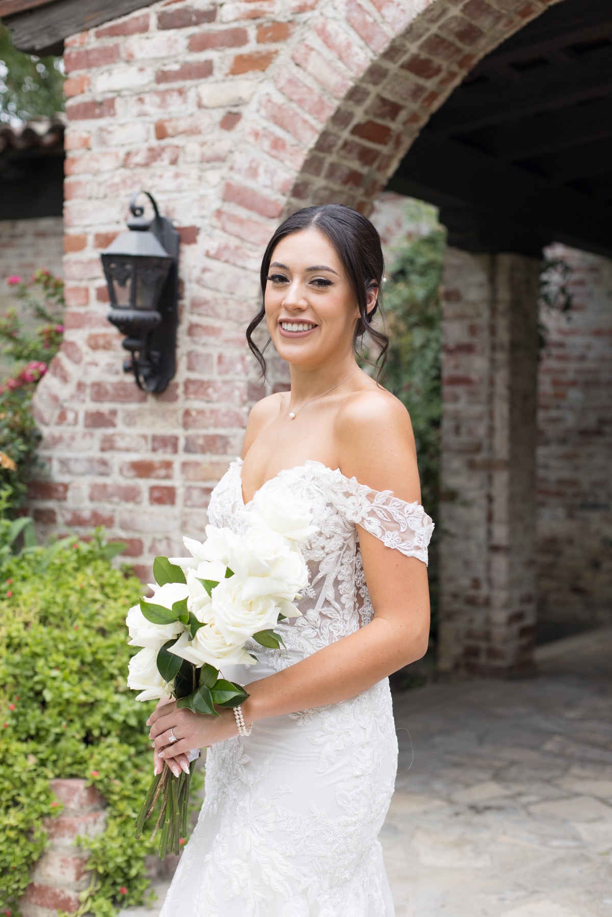 bride on her wedding day in a lace dress