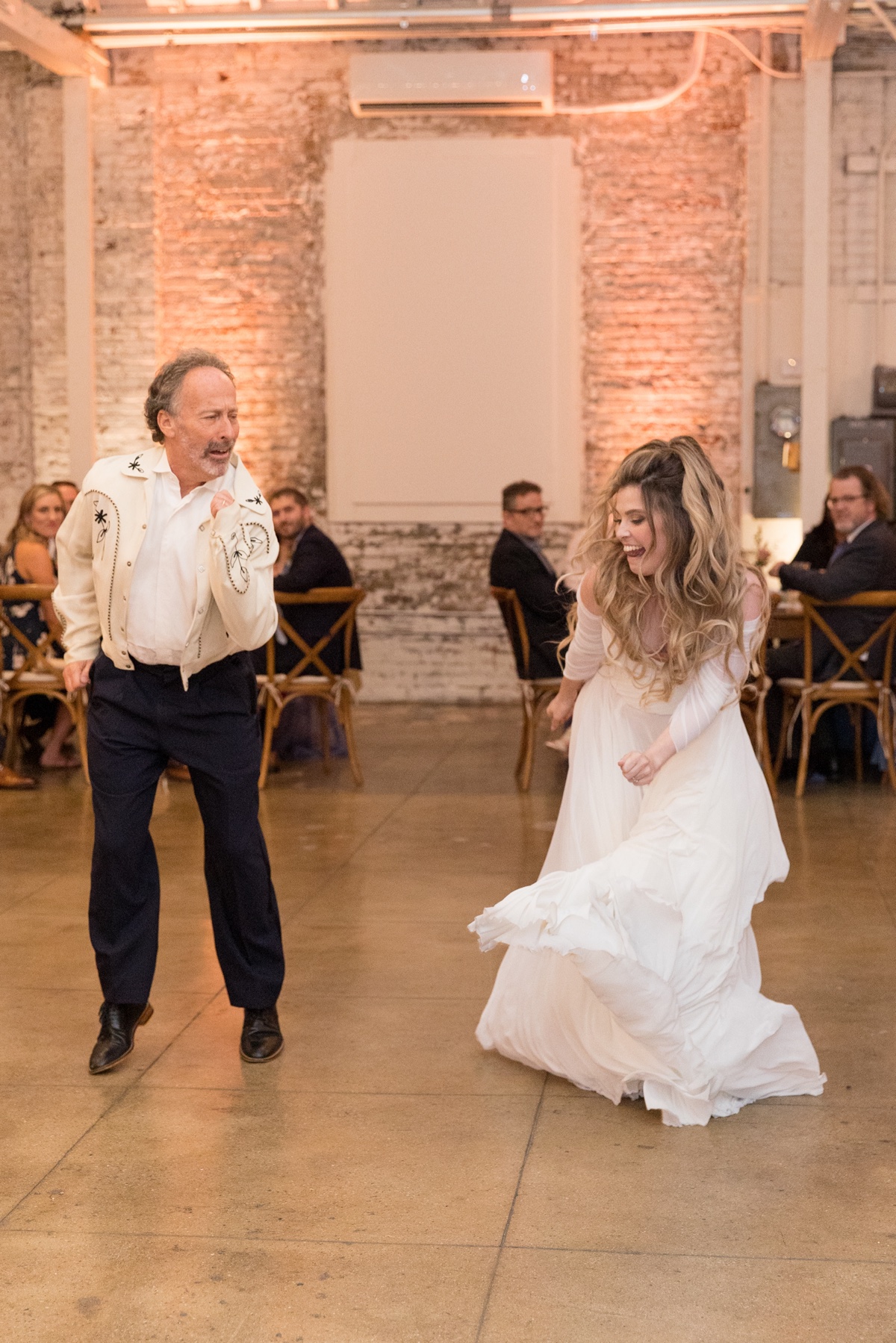 father daughter dance at wedding reception 