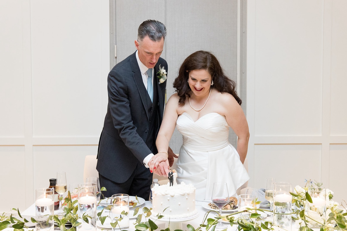 cutting wedding cake 