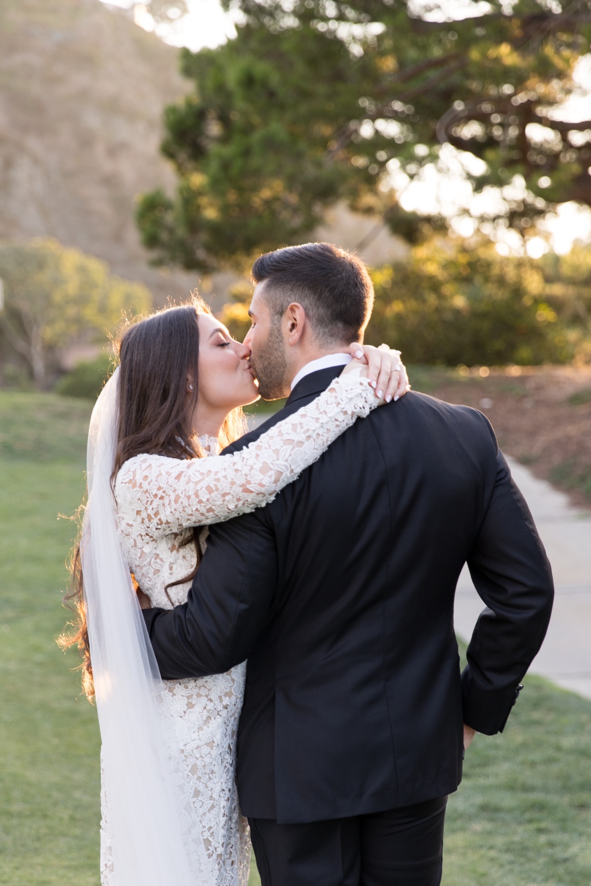 Bride and groom at golden hour during sunset portraits at the ranch at laguna beach