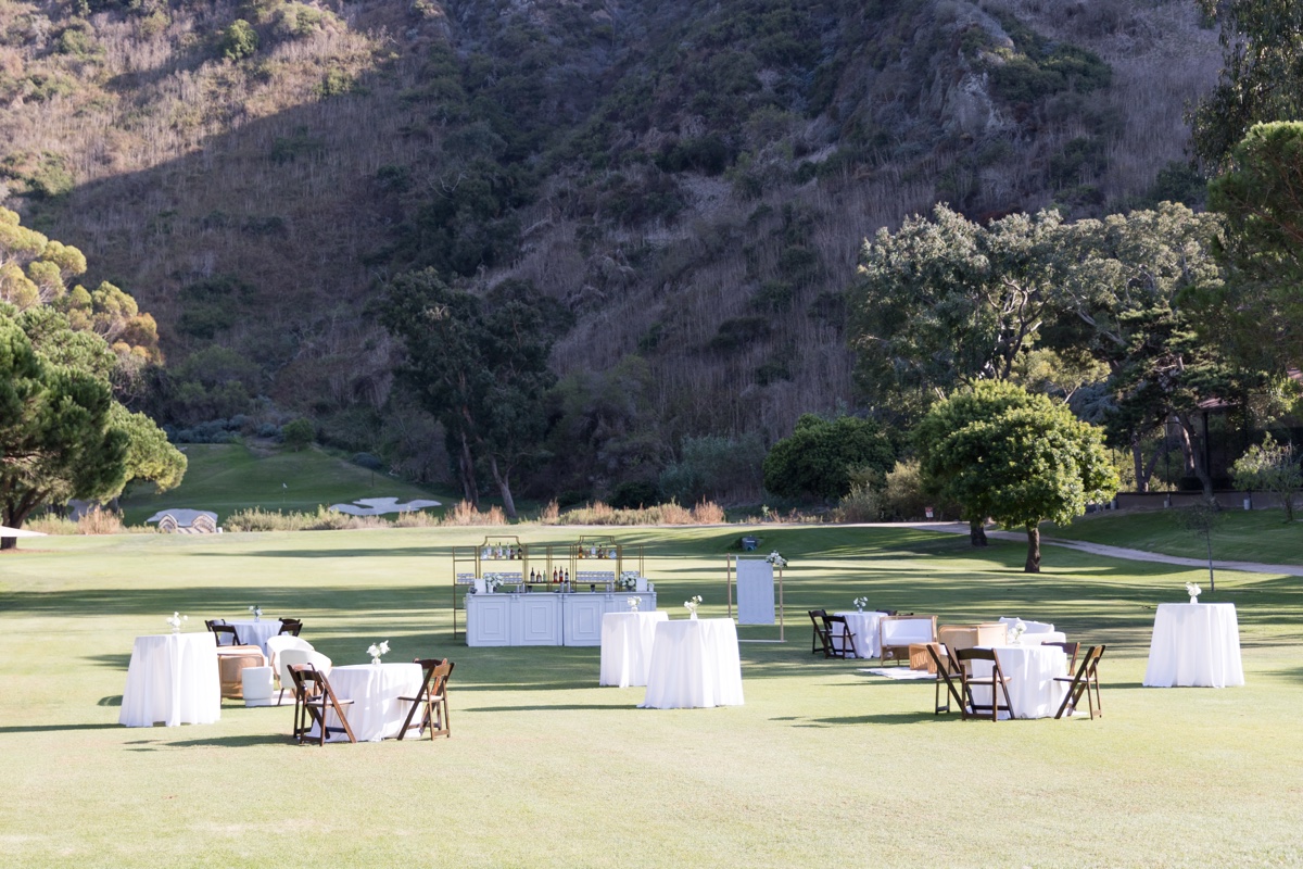Outdoor cocktail hour setup at The Ranch at Laguna Beach with lounge furniture and garden views in Laguna Beach