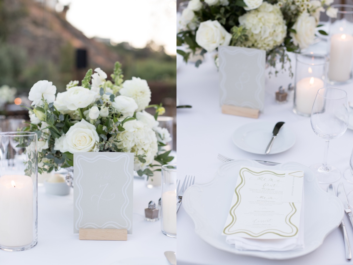 Elegant outdoor wedding reception at Laguna Ranch featuring white floral centerpieces, candles, and wooden chairs