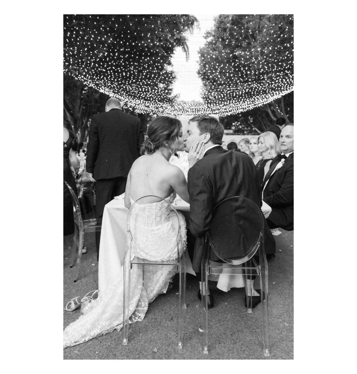 bride and groom kissing at their avalon hotel wedding reception.
