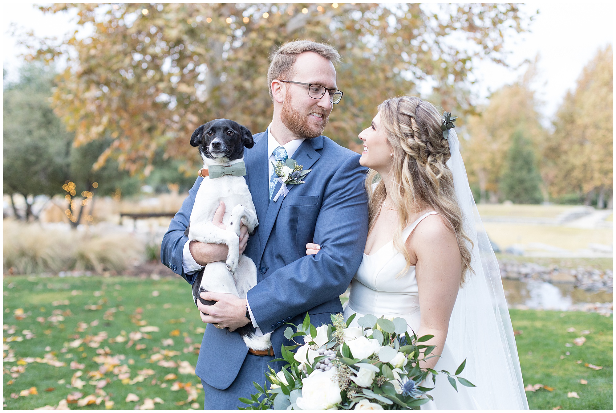 bride and groom with their dog