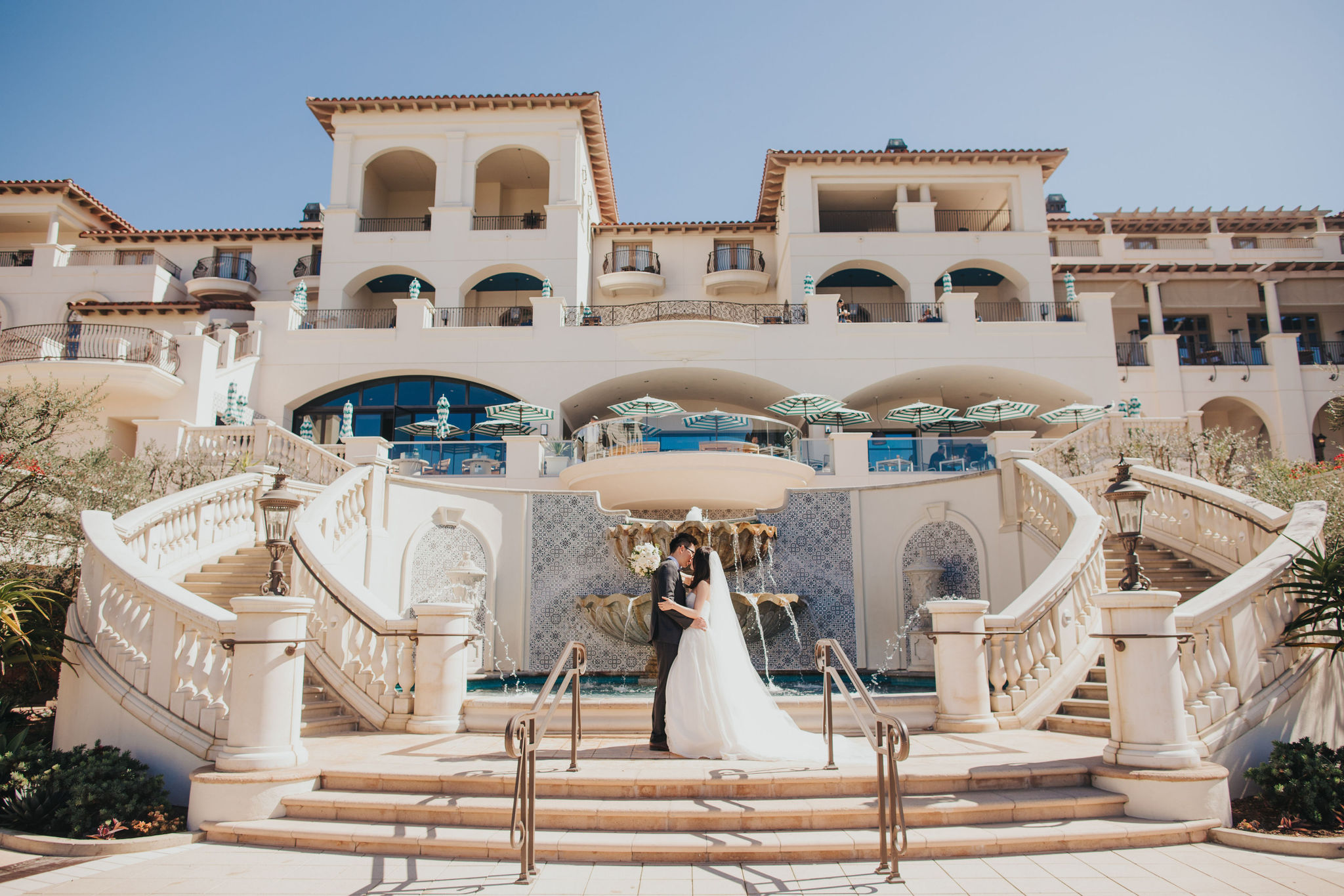 Monarch Beach Resort wedding portraits in front of staircase