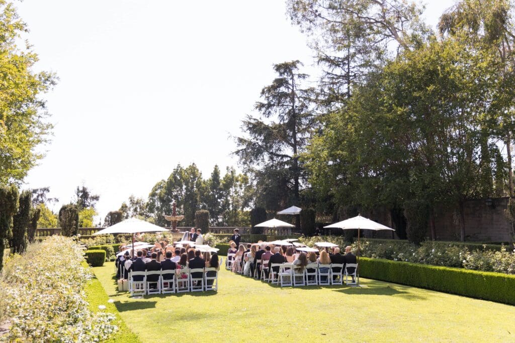 Outdoor summer wedding ceremony at Greystone Mansion